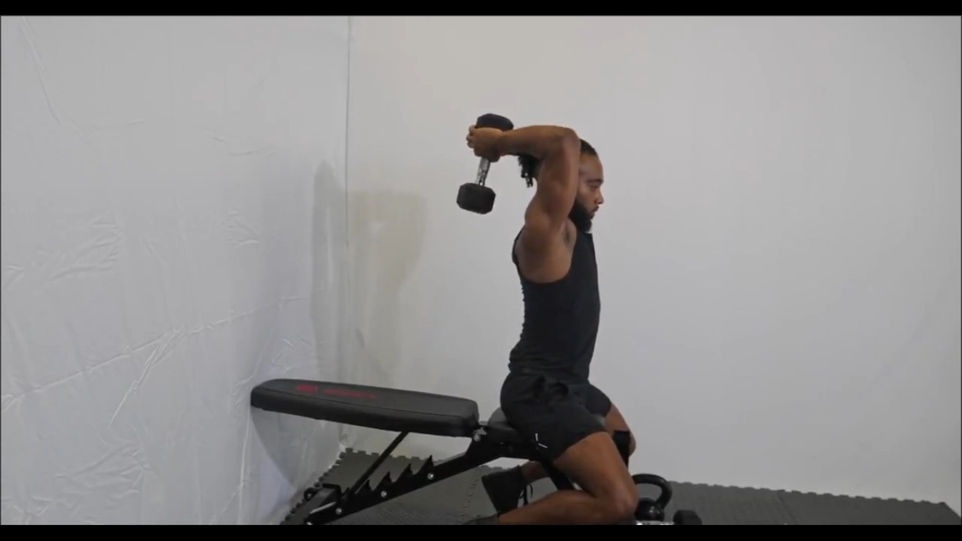 Dumbbell Seated Overhead Tricep Extension/ اورهد پشت بازو دمبل نشسته