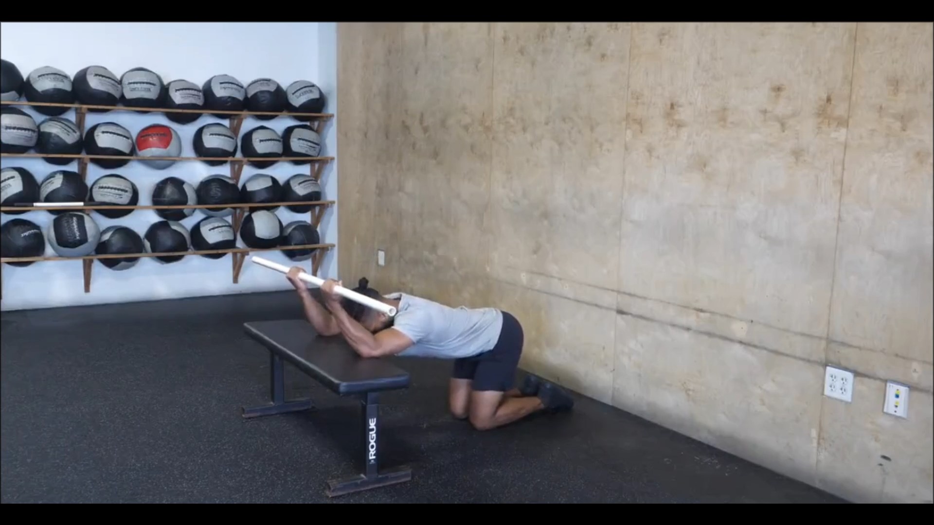 Lat And Shoulder External Rotation Stretch 1 Kneeling Dowel/ کشش زیر بغل و شانه روی زانو